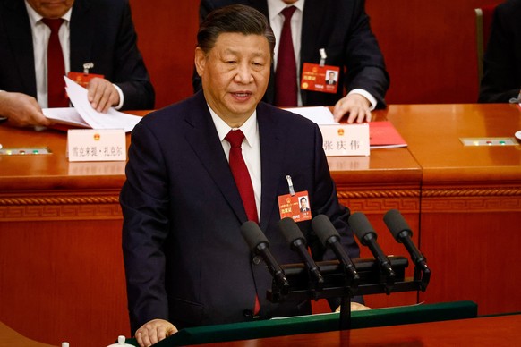 epa10518791 Chinese President Xi Jinping speaks during the Closing Session of the National People&#039;s Congress (NPC) at the Great Hall of the People, in Beijing, China, 13 March 2023. China holds t ...
