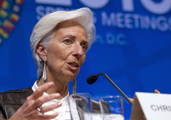FILE - In this Saturday, April 16, 2016, file photo, International Monetary Fund Managing Director Christine Lagarde speaks during a news conference after the International Monetary and Financial Committee conference at the World Bank/IMF Spring Meetings at IMF headquarters in Washington. The IMF said Wednesday, June 22, 2016, it is downgrading its forecast for the U.S. economy this year and says America should raise the minimum wage to help the poor and offer paid maternity leave to encourage more women to work. Lagarde, noting low unemployment and strong hiring over the past year, says “the U.S. economy is in good shape.’’ (AP Photo/Jose Luis Magana, File)