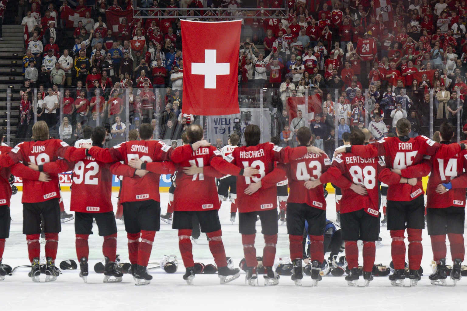 Switzerland?s player celebrate their victory during the Ice Hockey World Championship semi final match between Switzerland and Canada in Prague at the O2 Arena, Czech Republic, on Saturday, May 25, 20 ...