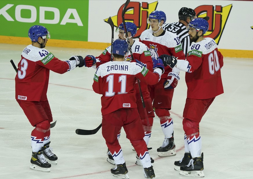 Players of Czech Republic celebrate during the Ice Hockey World Championship group A match between the Czech Republic and Belarus at the Olympic Sports Center in Riga, Latvia, Monday, May 24, 2021. (A ...