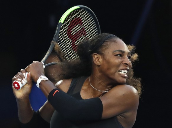 FILE - In this Jan. 28. 2017, file photo, United States&#039; Serena Williams follows through on a backhand return to her sister Venus during the women&#039;s singles final at the Australian Open tenn ...