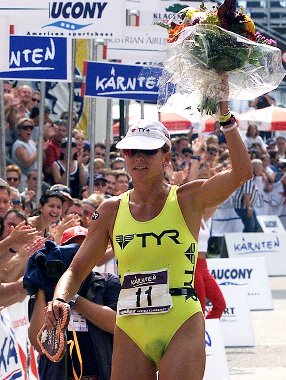 America's Wendy Ingraham wins as best woman the triathlon &quot;Ironmen&quot; in Klagenfurt, Austria on Sunday, July 23, 2000 with the time 9:12:50 hours. (AP Photo/Gert Eggenberger)