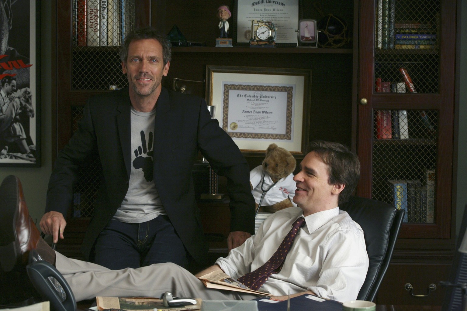 HOUSE -- "Alone" Episode 1 -- Pictured: (l-r) Hugh Laurie as Dr. Greg House and Robert Sean Leonard as Dr. James Wilson (Photo by Dean Hendler/NBCU Photo Bank/NBCUniversal via Getty Images v ...
