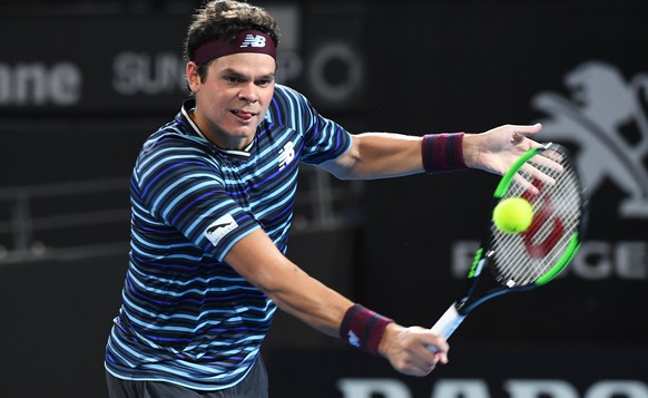 epa06414439 Milos Raonic of Canada in action during his second round match against Alex De Minaur of Australia at the Brisbane International Tennis tournament in Brisbane, Queensland, Australia, 03 Ja ...