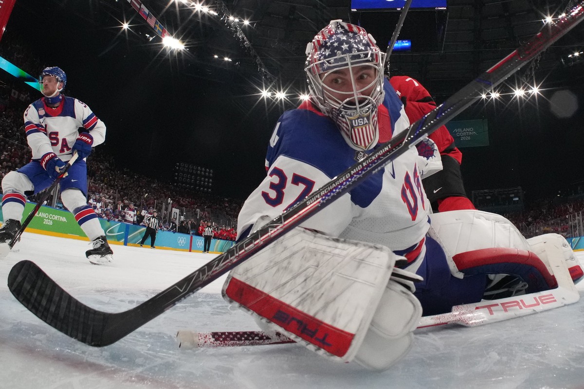 United States' Connor Hellebuyck (37) reacts during a men's ice hockey gold medal game between Canada and the United States at the 2026 Winter Olympics, in Milan, Italy, Sunday, Feb. 22, 202 ...