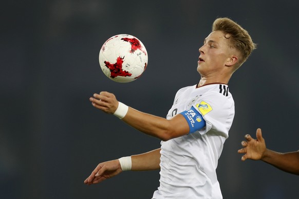 FILE - In this Oct. 16, 2017 file photo Germany's Jann Fiete Arp controls the ball during the FIFA U-17 World Cup against Colombia in New Delhi, India. Hamburger SV is relying heavily on the 17-year-o ...