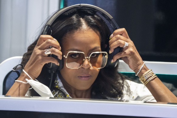 epa09932332 Former US First Lady Michaelle Obama in the Mercedes garage during Free Practice 3 of the Formula One Grand Prix of Miami at the Miami International Autodrome in Miami Gardens, Florida, US ...