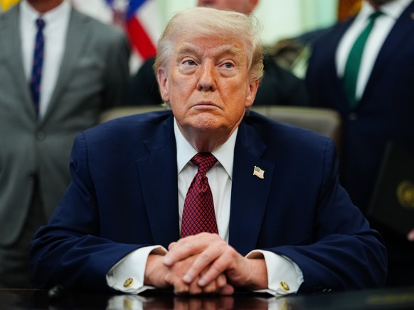 President Donald Trump listens in the Oval Office of the White House, Saturday, April 18, 2026, in Washington. (AP Photo/Julia Demaree Nikhinson)
Donald Trump