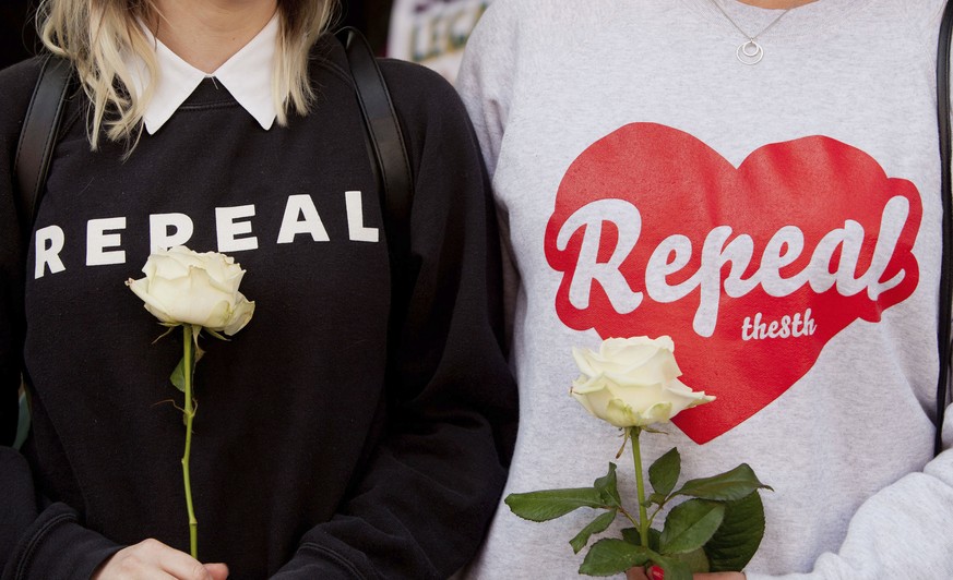 Demonstrators wear &quot;Repeal&quot; shirts during The March for Choice event in Dublin, Ireland, calling for a change to Ireland&#039;s strict abortion laws Saturday Sept. 30, 2017. The March for Ch ...