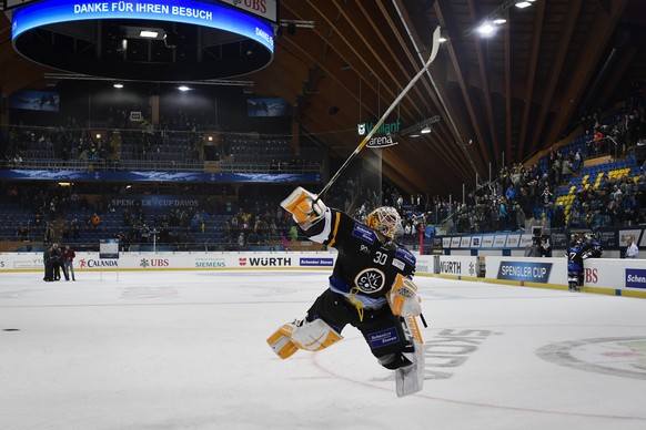 Lugano&#039;s goalkeeper Elvis Merzlikins celebrates after the game between HC Lugano and Avtomobilist Yekaterinburg, at the 90th Spengler Cup ice hockey tournament in Davos, Switzerland, Monday, Dece ...