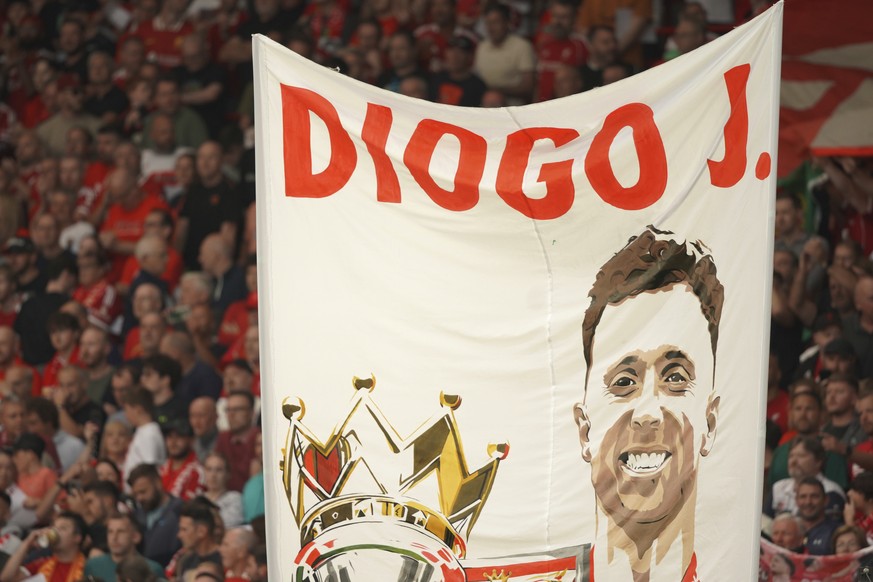 FILE -A banner depicting the late Liverpool player Diogo Jota is displayed on the stands before the English Premier League soccer match between Liverpool and Bournemouth at Anfield stadium in Liverpoo ...