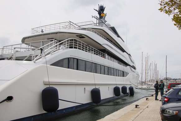 epa09869970 Civil Guards officers search the yatch &#039;Tango&#039;, which belongs to Renova Group head Viktor Vekselberg, in the port of Palma de Mallorca, Spain, 04 April 2022. The yacht was seized ...