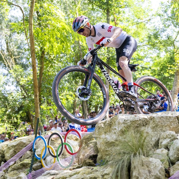 Mathias Flueckiger of Switzerland in action during the Men&#039;s Cross-country race at the 2024 Paris Summer Olympics in Paris, France, Monday, July 29, 2024. (KEYSTONE/Laurent Gillieron)