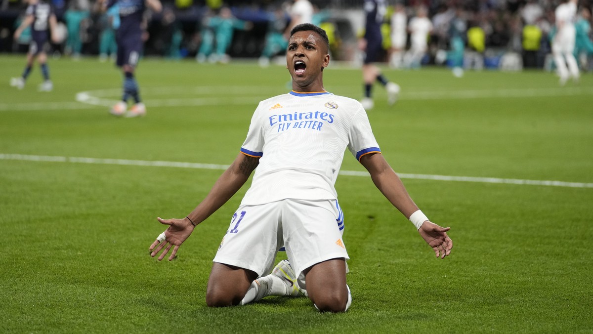 Real Madrid's Rodrygo celebrates his side's second goal during the Champions League semi final, second leg, soccer match between Real Madrid and Manchester City at the Santiago Bernabeu stad ...