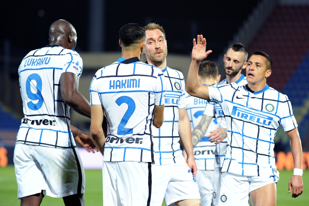 Inter Milan's Achraf Hakim, second from left, celebrates after scoring his side's second goal during the Italian Serie A soccer match between Crotone and Inter Milan at the Ezio Scida Stadiu ...