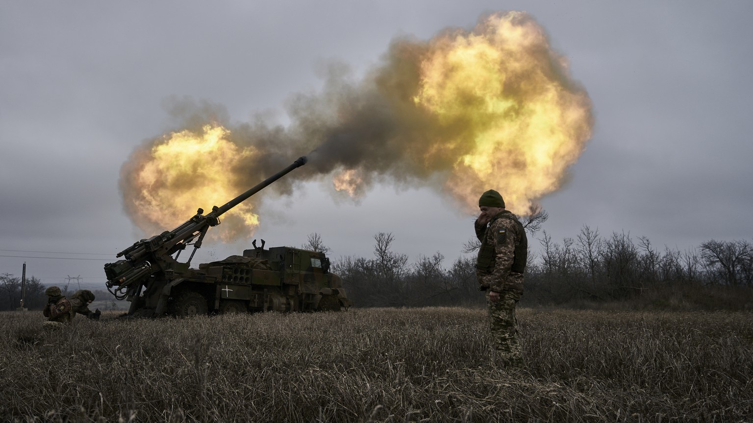 FILE - Ukrainian soldiers fire a French-made CAESAR self-propelled howitzer towards Russian positions near Avdiivka, Donetsk region, Ukraine, Monday, Dec. 26, 2022. French manufacturers have halved or ...
