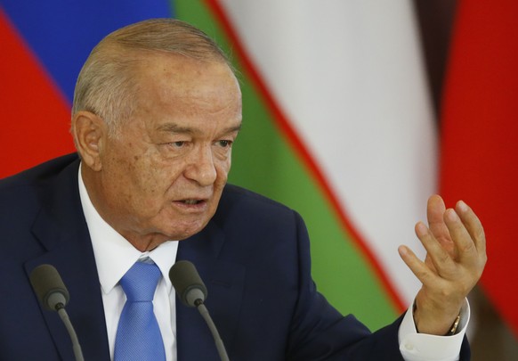 FILE - In this Tuesday, April 26, 2016 file pool photo Uzbek President Islam Karimov speaks at a joint news conference with Russian President Vladimir Putin following their meeting in the Kremlin in M ...