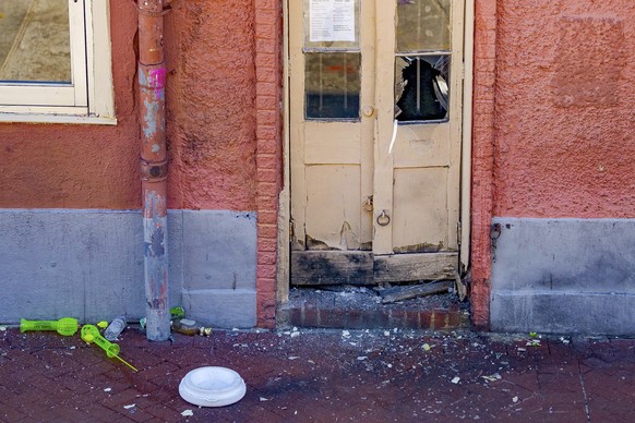 A damaged doorway is seen after members of the FBI and bomb squad detonated a suspicious package damaging the doorway according to an eyewitness on Bourbon Street during the investigation of truck cra ...