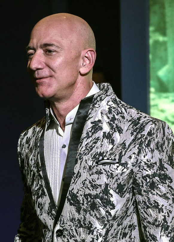 epa08133497 Amazon Founder and CEO Jeff Bezos poses for photographs during an event in Mumbai, India, 16 January 2020. According to media reports, Bezos announced an investment worth over one billion  ...