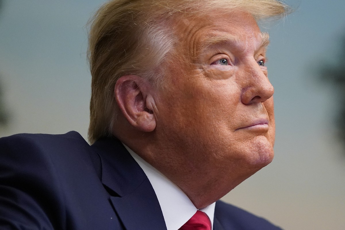 President Donald Trump participates in a video teleconference call with members of the military on Thanksgiving, Thursday, Nov. 26, 2020, at the White House in Washington. (AP Photo/Patrick Semansky)
 ...