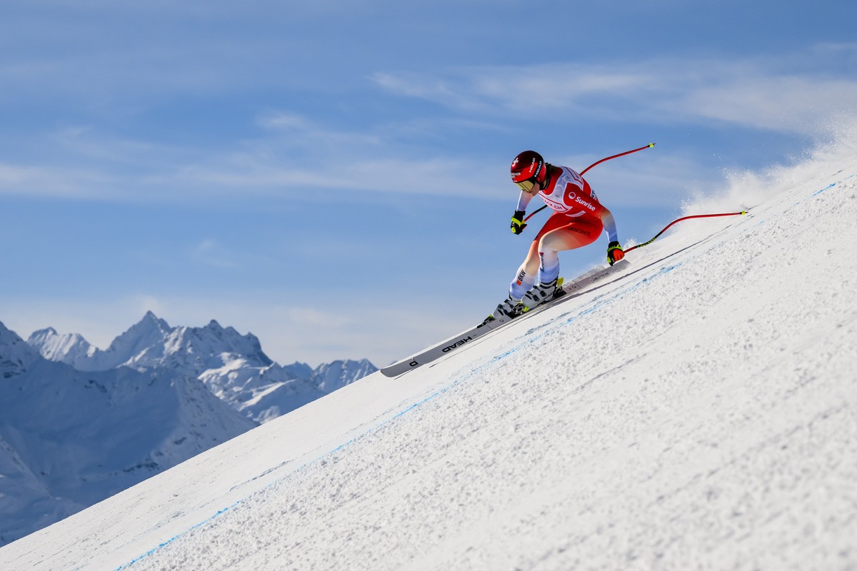 Corinne Suter of Switzerland in action during the women's Downhill race at the Alpine Skiing FIS Ski World Cup, in St. Moritz, Switzerland, Saturday, December 9, 2023. (KEYSTONE/Jean-Christophe B ...
