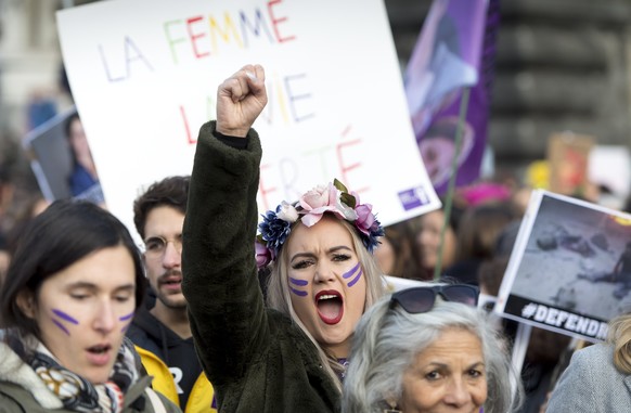 epaselect epa08019806 Women shout slogans as they march during a demonstration against gender-based and sexual violence in Lausanne, Switzerland, 23 November 2019. EPA/LAURENT GILLIERON