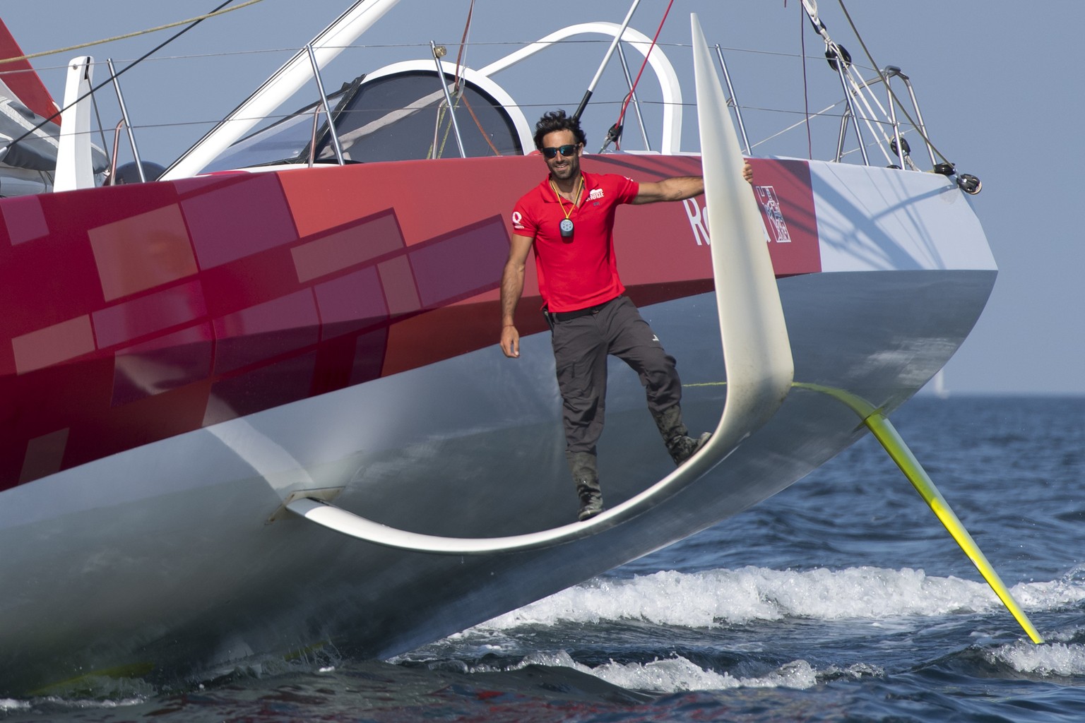 The 60-foot monohull IMOCA &quot;La Fabrique&quot; SUI7 sails with Swiss skipper Alan Roura onboard during a training session two months before the start of the Route du Rhum sailing race, at the west ...