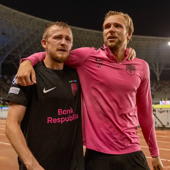 Tymoteusz Puchacz and Aleksey Isayev cries after advancing to the Champions League seen during UEFA Champions League 26 27 4th qualifying round 2ed leg match between teams of Sabah FK and Hapoel Beer  ...