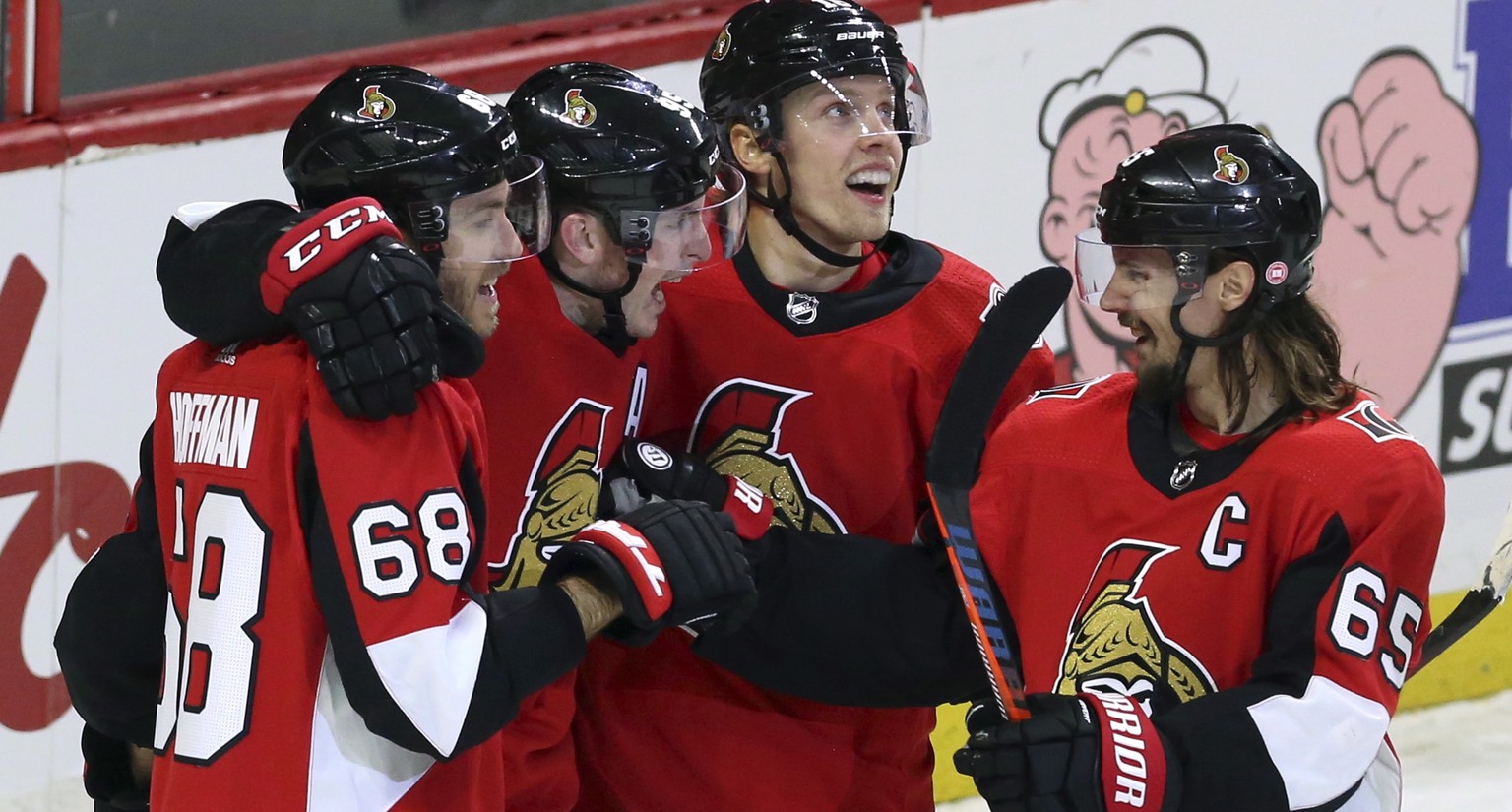 Ottawa Senators center Matt Duchene (95) celebrates his third period goal with teammates left wing Mike Hoffman (68) left wing Ryan Dzingel (18) and left wing Mike Hoffman (68) during NHL hockey again ...