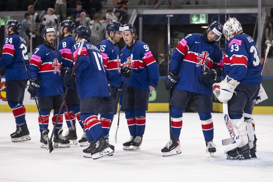 Great Britain's players reacts after the defeat in the 2026 IIHF Men's Ice Hockey World Championship preliminary round group A game between Great Britain and Latvia, at the Swiss Life Arena  ...
