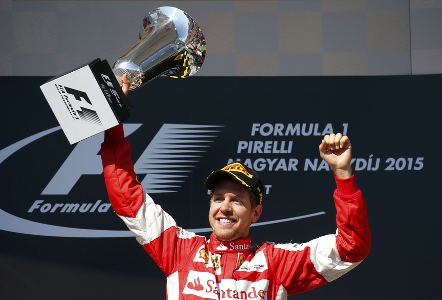 Vettel bejubelt seinen zweiten Saisonsieg.