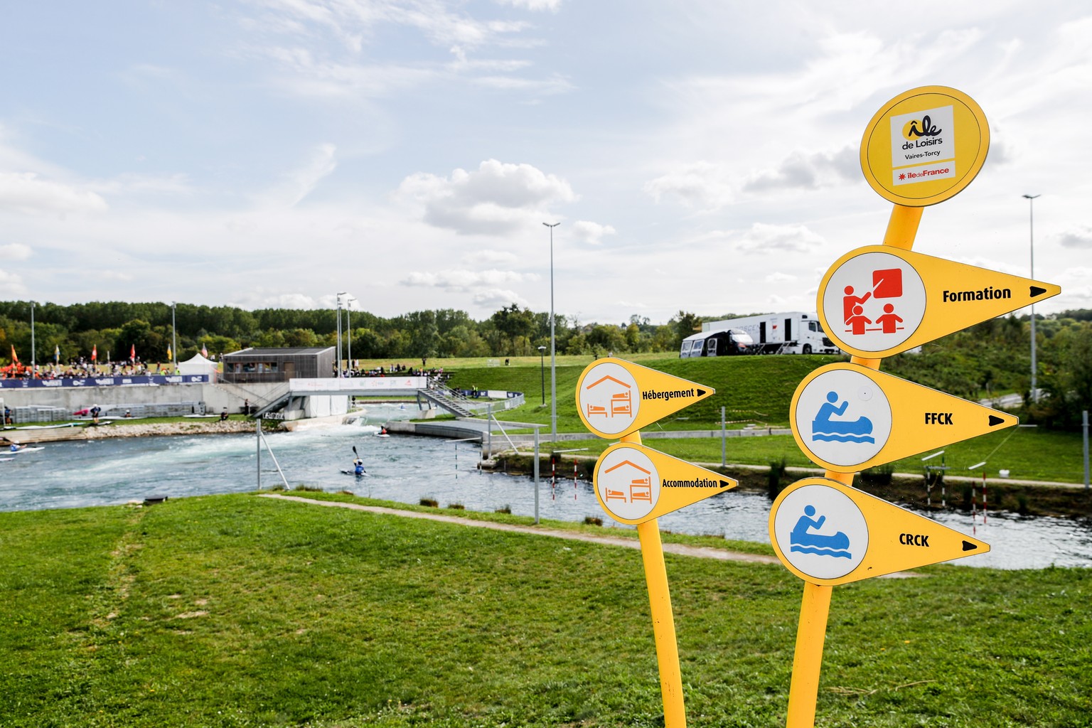 epa10901582 Signs at the nautical stadium during the Canoe Slalom World Cup in Vaires sur Marne, suburbs of Paris, France, 05 October 2023. The Canoe Slalom World Cup takes place from October 05 to 08 ...