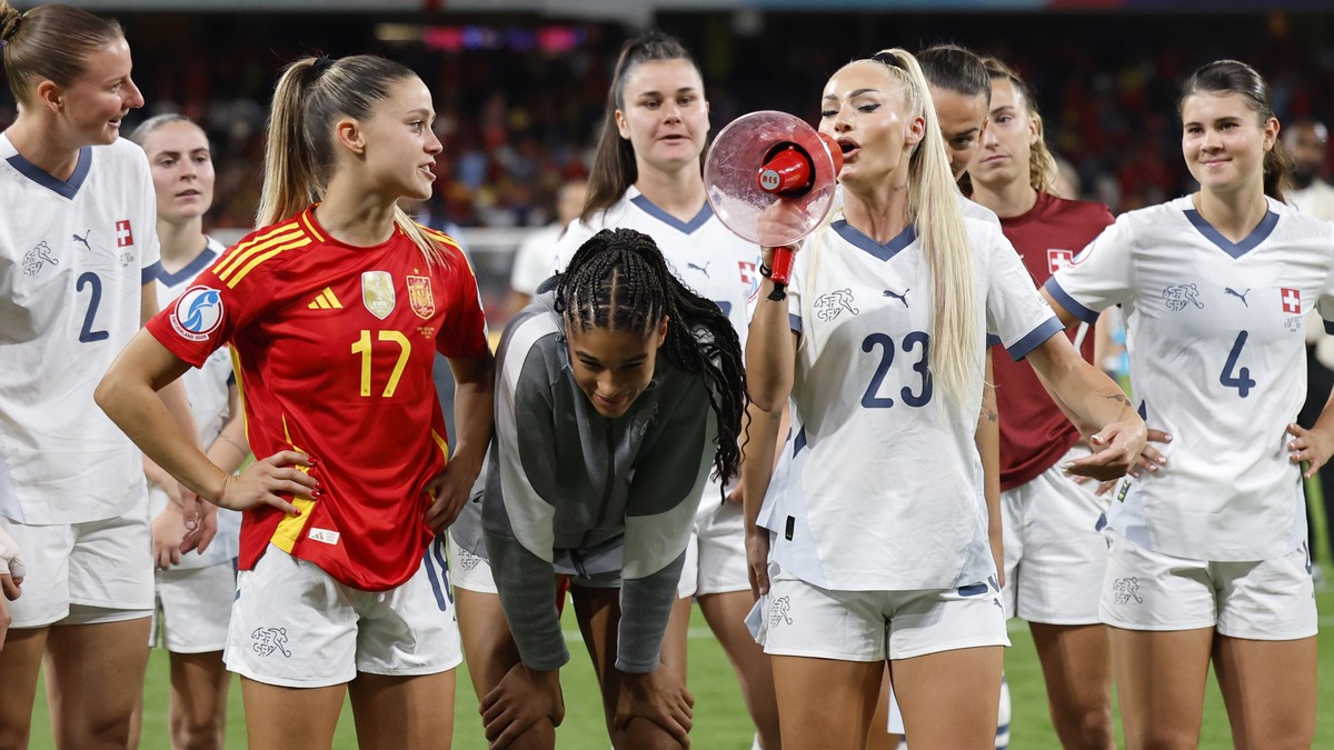 Switzerland's Alisha Lehmann talks beside her teammates to the fans after losing the UEFA Women's EURO 2025 quarterfinals soccer match between Spain and Switzerland at the Wankdorf stadium i ...