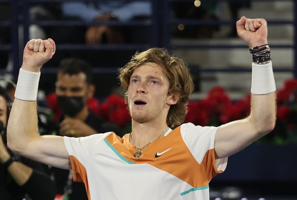 epa09787376 Andrey Rublev of Russia celebrates winning his final match against Jiri Vesely of the Czech Republic at the Dubai Duty Free Tennis ATP Championships 2022 in Dubai, United Arab Emirates, 26 ...