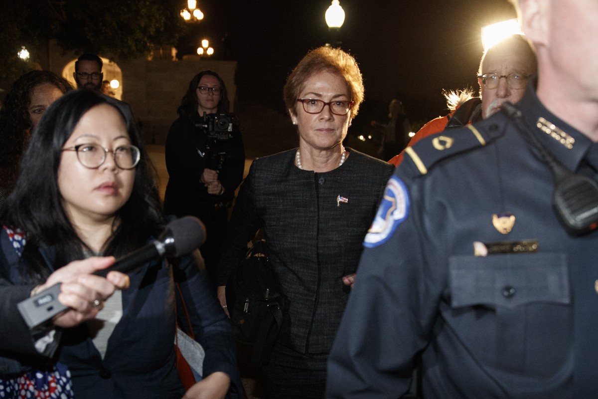 epa07914439 Former US ambassador to Ukraine, Marie Yovanovitch (C) departs the US Capitol in Washington, DC, USA, 11 October 2019. Ambassador Yovanovitch testified for about nine hours to investigator ...