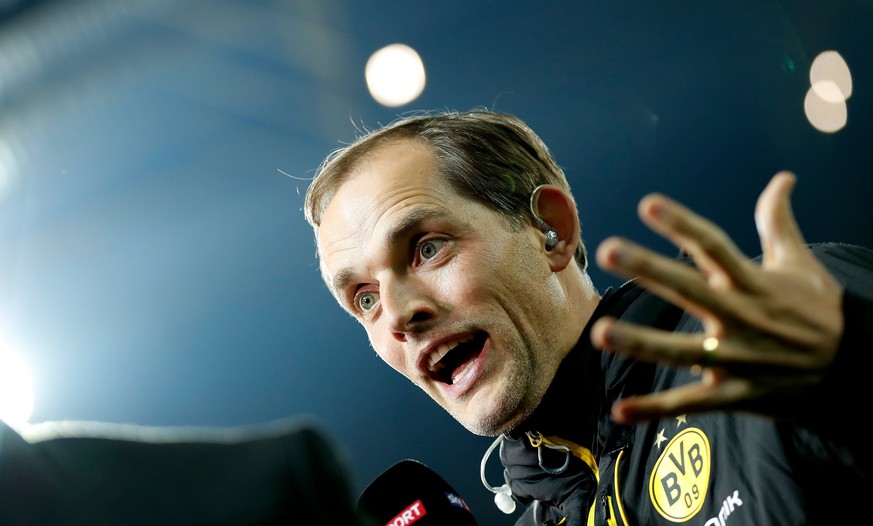 epa05855148 Dortmund&#039;s head coach Thomas Tuchel prior to the German Bundesliga soccer match between Borussia Dortmund and FC Ingolstadt in Dortmund, Germany, 17 March 2017. EPA/FRIEDEMANN VOGEL E ...