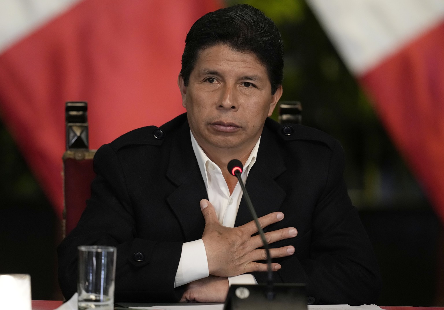 FILE - Peruvian President Pedro Castillo gives a press conference at the presidential palace in Lima, Peru, Oct. 11, 2022. On Wednesday, Dec. 7, 2022, Castillo faces a third impeachment attempt by Con ...