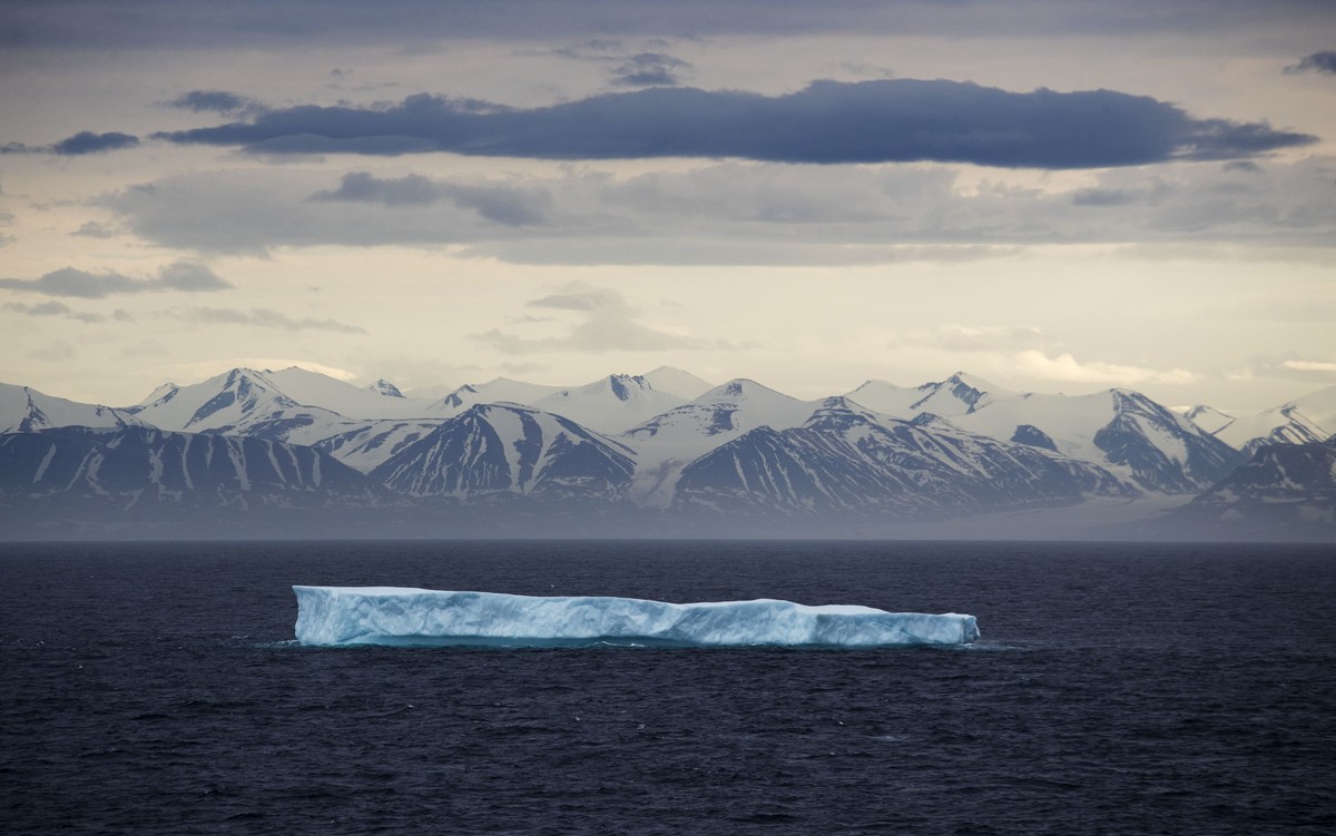 2017 AP YEAR END PHOTOS - An iceberg floats past Bylot Island in the Canadian Arctic Archipelago on July 24, 2017. Icebergs aren't sea ice, despite being best known for floating about the ocean.  ...