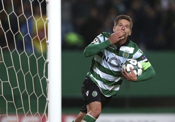 FILE - In this file photo dated Tuesday, Nov. 22, 2016, Sporting&#039;s Adrien Silva celebrates scoring during a Champions League, Group F soccer match between Sporting CP and Real Madrid at the Alval ...