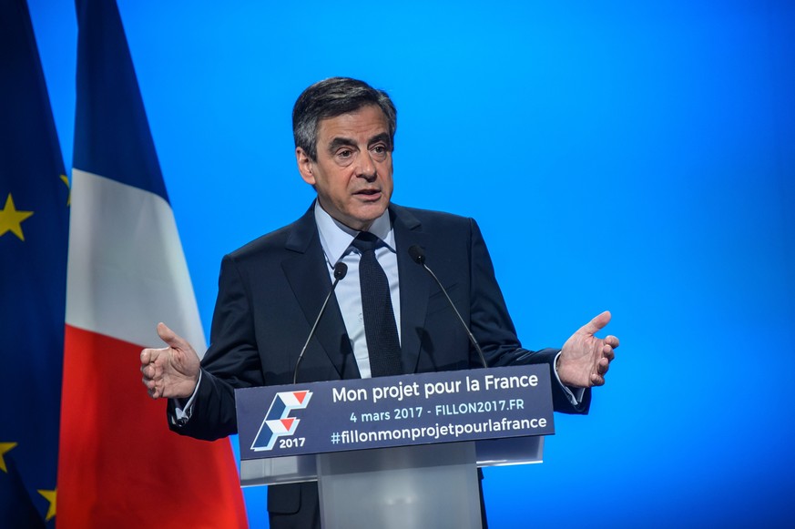 epa05829327 Les Republicans party candidate for 2017 presidential election, Francois Fillon delivers a speech during a campaign event in Aubervilliers, near Paris, France, 04 March 2017. During a pres ...