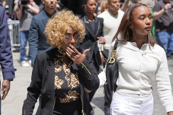 Family and supporters of Sean &quot;Diddy&quot; Combs, including his mother Janice Combs, left, return to the courthouse after a break in New York, Monday, May 12, 2025. (AP Photo/Seth Wenig)
Janice C ...