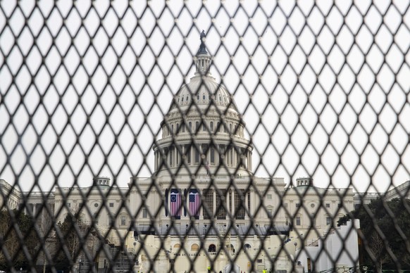 epaselect epa08931839 New security fencing surrounds the US Capitol in Washington, DC, USA, 11 January 2021. Speaker of the House Nancy Pelosi plans to introduce articles of impeachment against US Pre ...