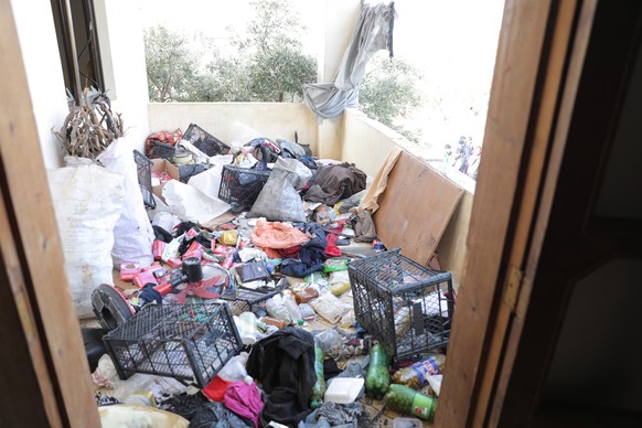 epa09724944 A damaged house is seen after an alleged counterterrorism operation by US Special forces in the early morning in Atma village in the northern countryside of Idlib, Syria, 03 February 2022. ...