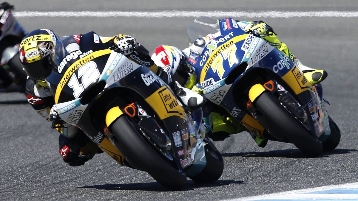 epa05275876 Swiss Moto2 rider Thomas Luethi (L), of Derendinger Interwetten, followed by countryman, Dominique Aegerter, of Technomag Interwetten, in action during the Spanish Motorcycling Grand Prix  ...
