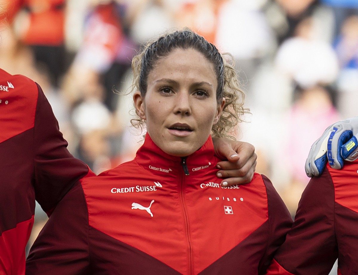 Switzerland's Lia Waelti, Gaelle Thalmann, Ana-Maria Crnogorcevic and Luana Buehler, from right, sing the national anthem prior to the FIFA Women's World Cup 2023 qualifying round group G so ...