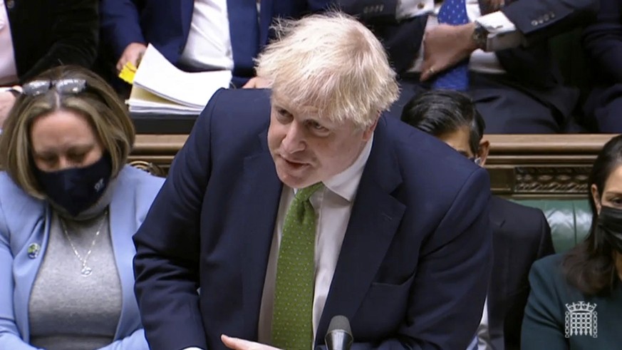 In this screen shot taken from video, Britain&#039;s Prime Minister Boris Johnson speaks during Prime Minister&#039;s Questions in the House of Commons, London, Wednesday, Jan. 19, 2022. Johnson faced ...