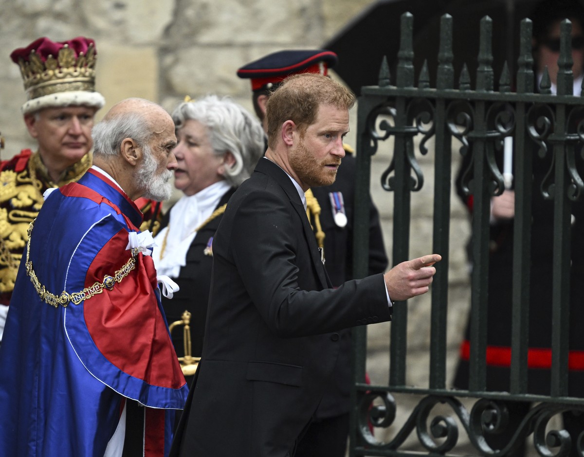Britain's Prince Harry leaves after the coronation ceremony of King Charles III and Queen Camilla in central London, Saturday, May 6, 2023. (Kevin Quigley/Pool Photo via AP)