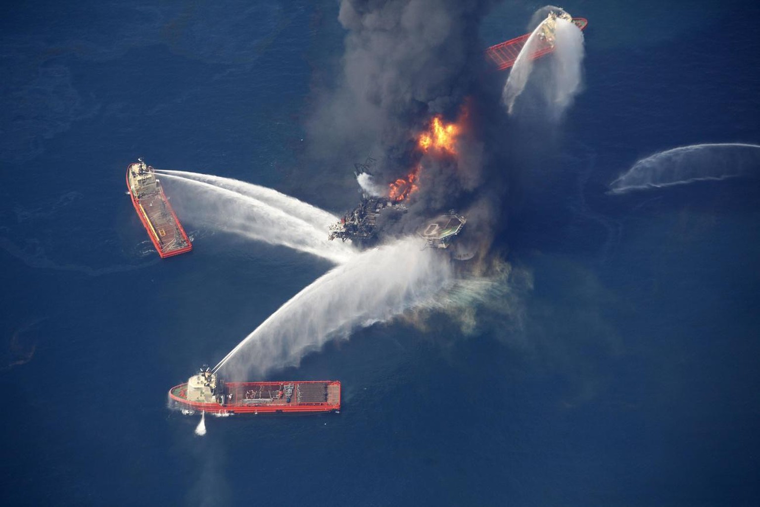 In this aerial photo taken in the Gulf of Mexico, more than 50 miles southeast of Venice on Louisiana&#039;s tip, the Deepwater Horizon oil rig is seen burning Wednesday, April 21, 2010. (AP Photo/Ger ...