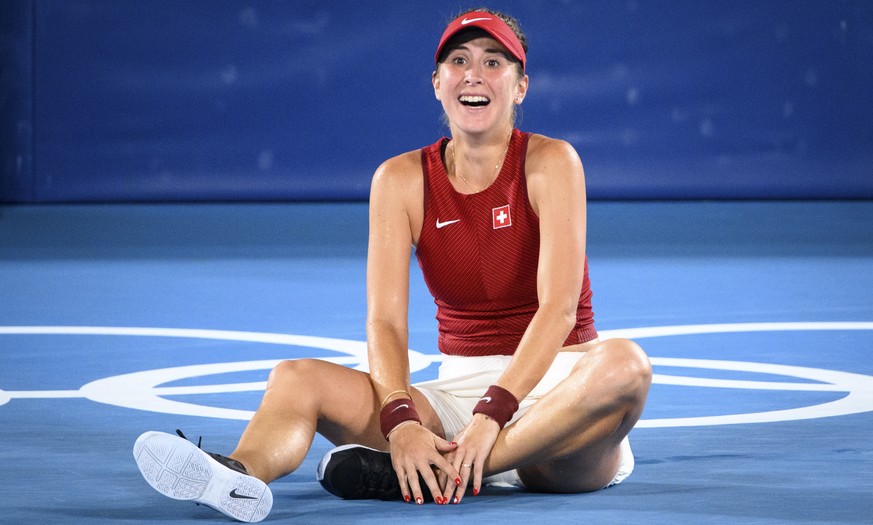 epa09383139 Belinda Bencic of Switzerland reacts after defeating Marketa Vondrousova of the Czech Republic in their women&#039;s singles tennis gold medal final match of the Tokyo 2020 Olympic Games a ...