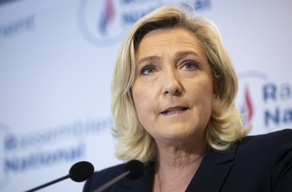 epa09306533 Far-right Rassemblement National (RN) party president Marine Le Pen delivers a statement at the party headquarters in Nanterrre near Paris, France, 27 June 2021. Polls closed after a secon ...